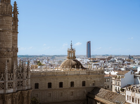 View of the town of Seville with the Sevilla Tower in the background as seen from the tower of Giralda, Andalusia, Spain