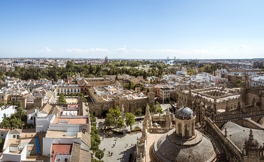 View of the town of Seville with the walls of the Alcazar as seen from the tower of Giralda, Andalusia, Spain