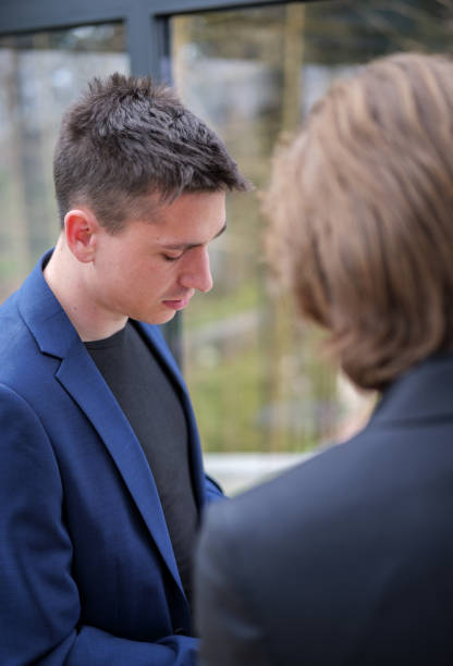 istock Two businessmen looking at something below and out of frame 2149388908