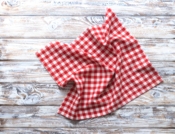 istock Red checkered picnic cloth top view on rustic wooden background empty copy space. 2149392633