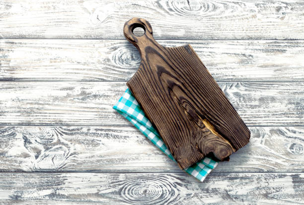 istock Wooden rustic vintage cutting board top view empty space background, food decor advertisement design. 2149392645