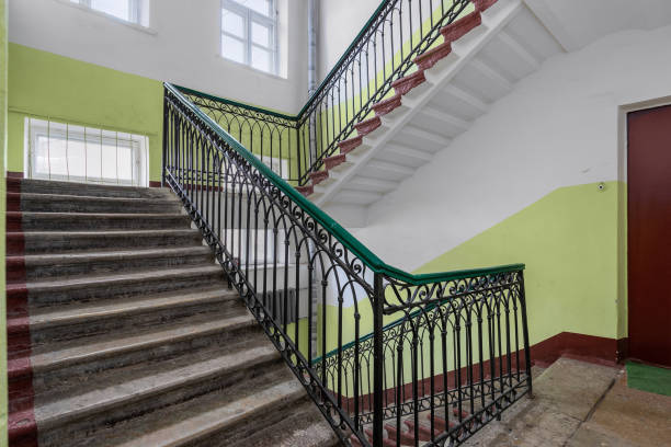 istock Stone marble staircase with wrought iron railings in a historic building. 2149393264