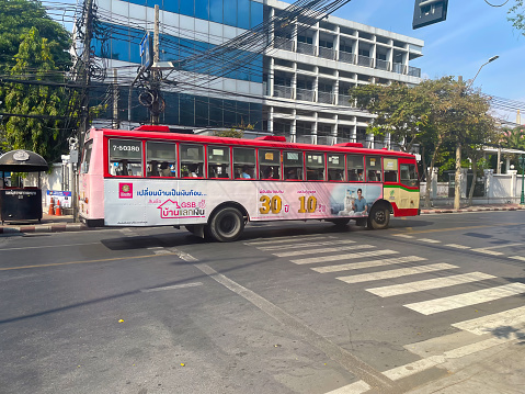Bangkok, Thailand - 30 December, 2023: Public bus in Bangkok, Thailand. Bus of Bangkok Mass Transit Authority. BMTA is the main operator of public transit buses within the Greater Bangkok area