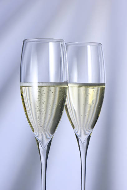 istock Two glasses with champagne close up 2149395090