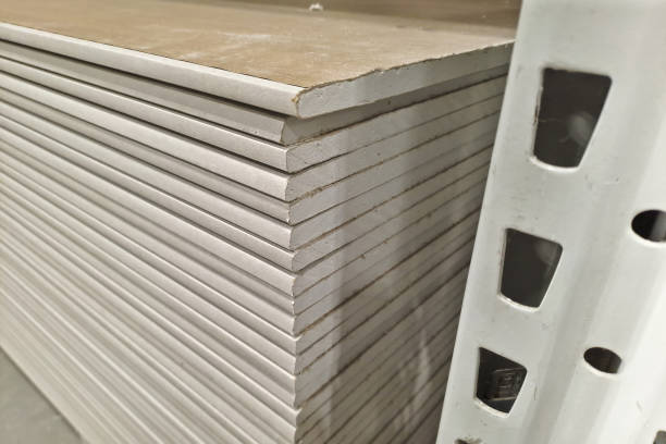 istock Pallet of plasterboard sheets in a construction site 2149395389