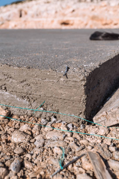 istock Concrete slabs laid for building foundation. 2149396916