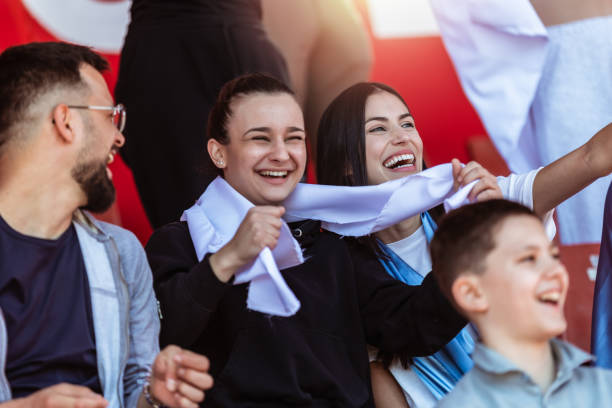 istock Sport fans cheering at the game on stadium. . 2149397775