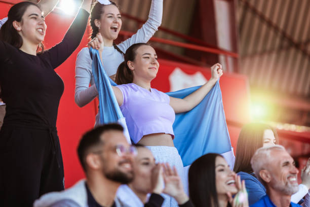 istock Sport fans cheering at the game on stadium. . 2149397778