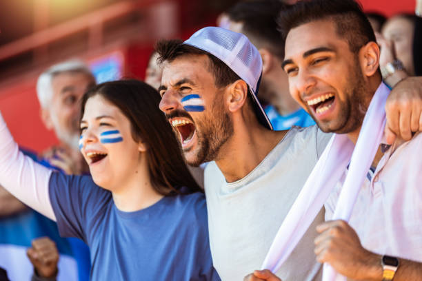 istock Sport fans cheering at the game on stadium. . 2149397941