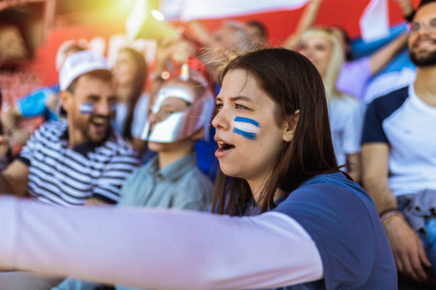 istock Sport fans cheering at the game on stadium. 2149397991
