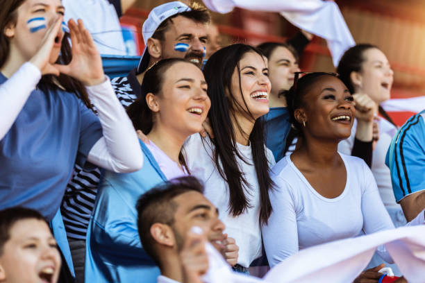 istock Sport fans cheering at the game on stadium. 2149398742