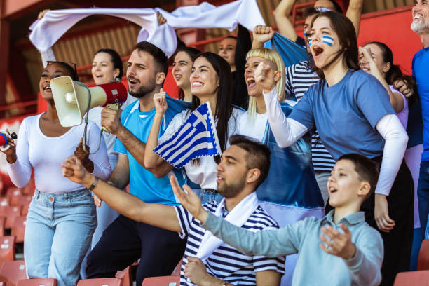 istock Fans cheering at the game on stadium. 2149398782