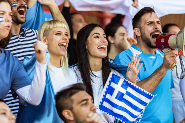 istock Fans cheering at the game on stadium. 2149398783