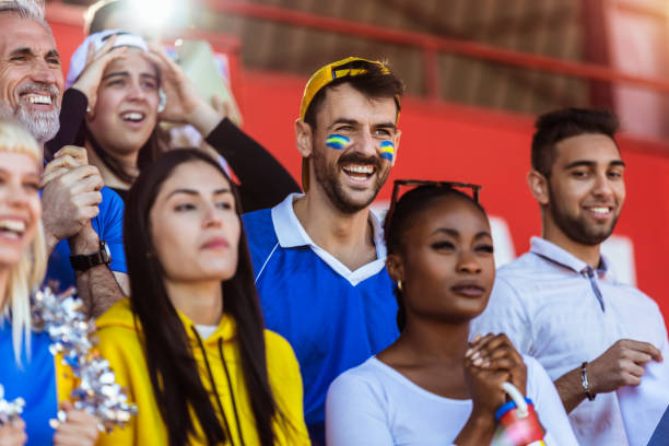 istock Sport fans cheering at the game on stadium. 2149398864