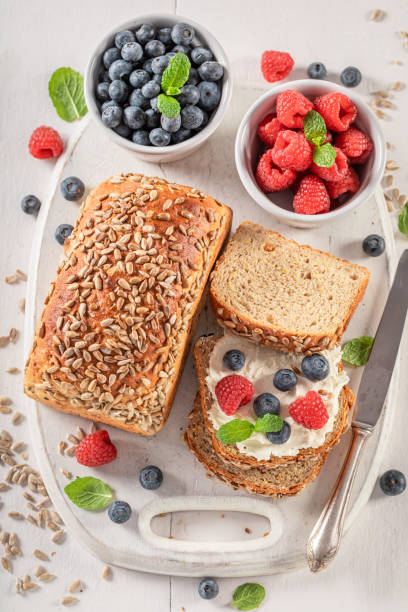 istock Homemade and sweet whole grain bread with cheese and berries. 2149403577