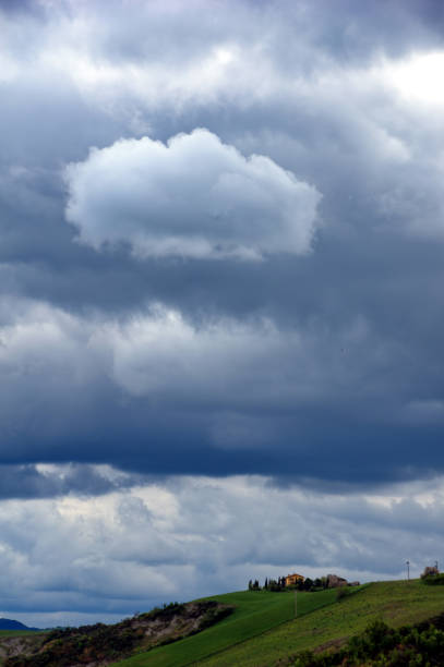 istock house on the hill under a stormy sky 2149403625