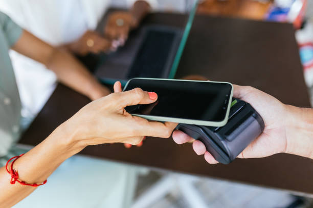 istock Contactless Payment in Action: Utilizing Mobile Phone for a Seamless Transaction 2149404637
