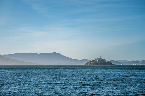 Alcatraz Island with mountain in Atmospheric haze during springtime day in San Francisco