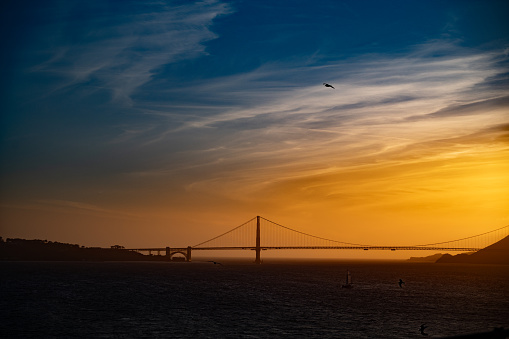 Golden Gate bridge at distance during springtime golden hour in San Francisco