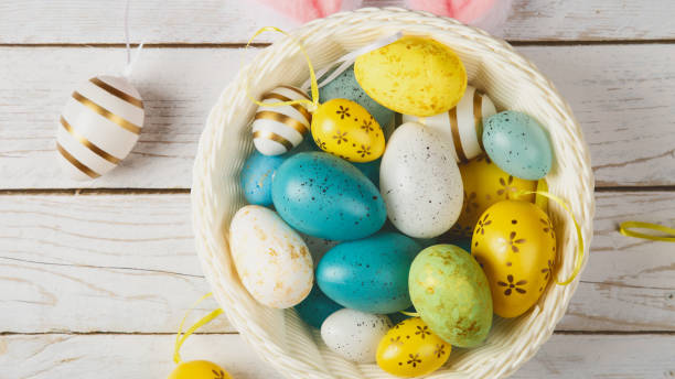 istock happy easter. holidays background with easter eggs decoration on wooden background 2149411522