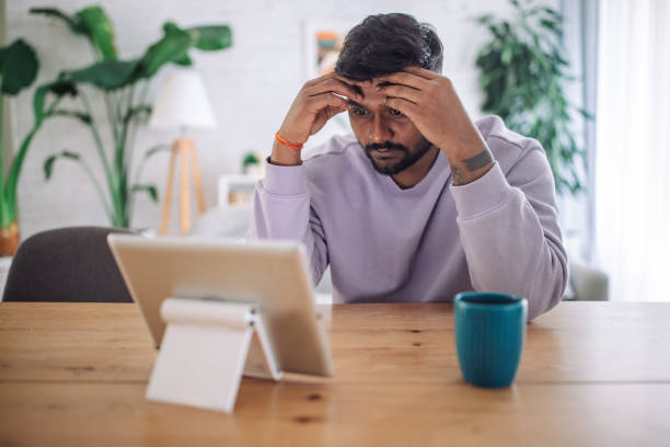 istock Young indian man working from home 2149416266