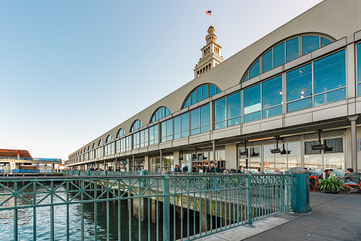 San Francisco, California, April 8, 2024. The Ferry Building in San Francisco viewed from the waterfront, showing its marketplace and iconic tower