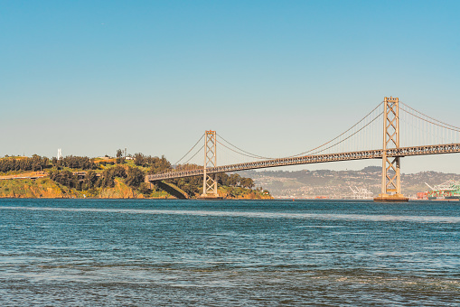 San Francisco, California, April 8, 2024. Engineering over water: The Bay Bridge connects cities across the shimmering San Francisco Bay.