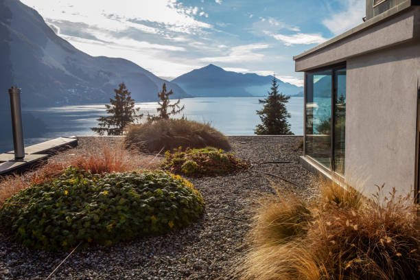 istock Amazing rooftop with gardening on it (apartment building next to water)  Lugano lake 2149419021