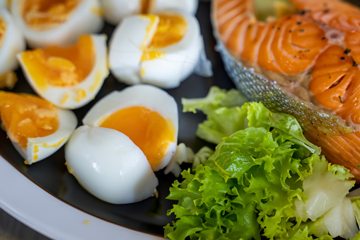 Dieting, low carb eggs and salmon fish