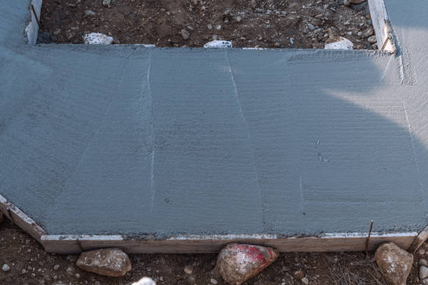 istock Concrete slabs laid for building foundation. 2149421291