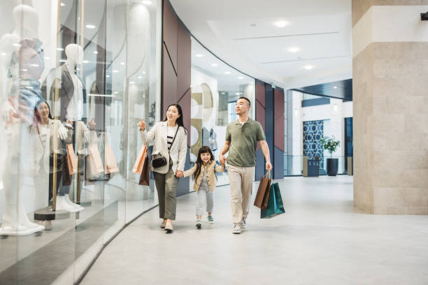 Asian family shopping on vacation