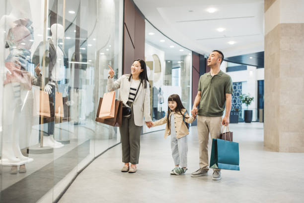 istock Asian family shopping on vacation 2149424263