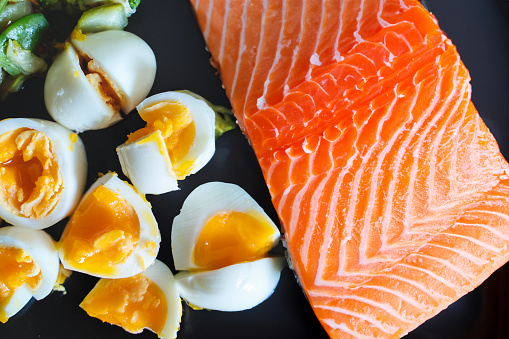 Dieting, low carb eggs and salmon fish