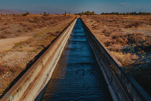 Water supply canal in arid desert area