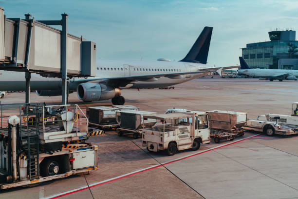 istock Service vehicles at the airport at evening 2149427466