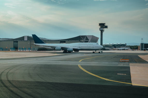 istock Airport with airplanes at summer evening 2149427680