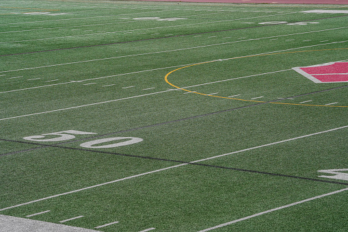 The ten ( 10 ) yard dividing line on an American football field. This is a School football / Soccer field in Oregon.