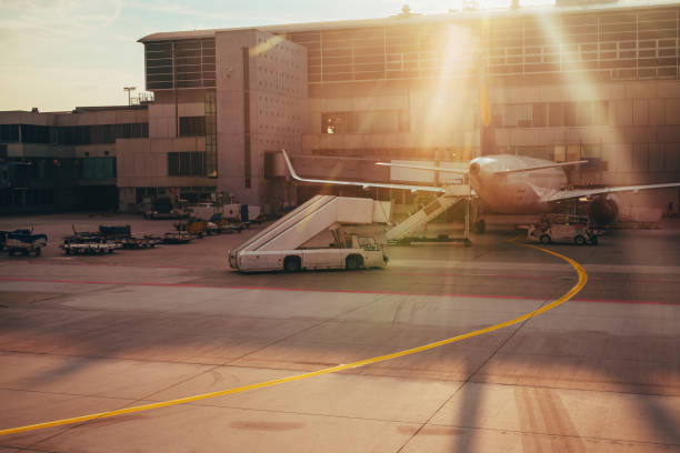 istock Airport building with airplane at warm sunset light 2149427969