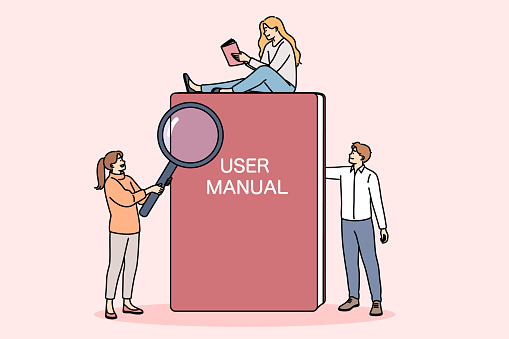 Book with user manual next to miniature people reading tips and rules for using product. Textbook with inscription user manual on cover is intended for teaching independent use of equipment