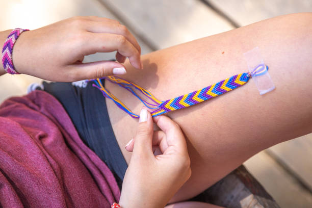 istock Close-up of making friendship woven bracelet by string 2149433925