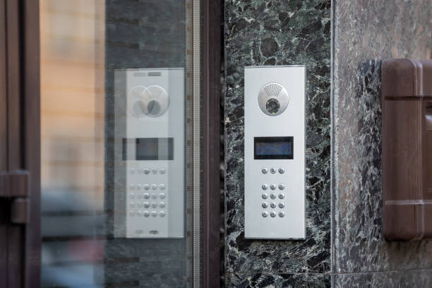 istock An intercom with buttons and a camera on a marble wall at a building's entrance. 2149437114
