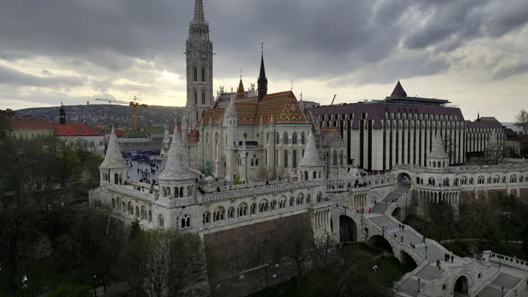 Aerial view of Fisherman's Bastion in Budapest at sunset cloudy weather, Europe's Famous Fisherman's Bastion, tourist visit in Budapest Fisherman's Bastion