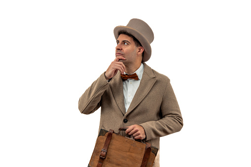 vintage gentleman is depicted with a pensive expression and thoughtful gaze, He holds a briefcase firmly, adding to the air of sophistication and business demeanor white background