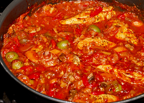 Homemade Organic Chicken Cacciatore in pan on stove top