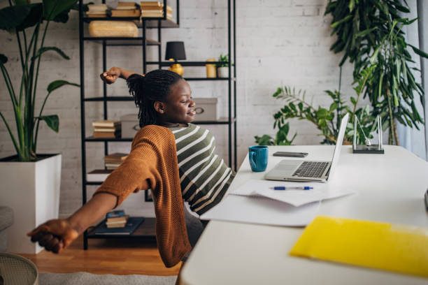 istock Young woman relaxing at home office 2149444993