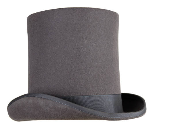 istock Magic hat. Topper. Elegant vintage gray beige wool felt top hat with black band. Grosgrain ribbon trim around rolled brim. Isolated on white background. Close-up. Copy space. Cut out. Clipping path. 2149446134
