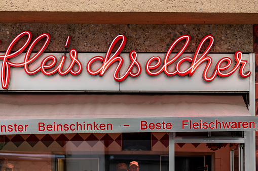 Vienna, Austria April 5, 2024 A red retro sign in German meaning butcher shop.