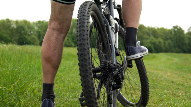 istock Bicyclist Outdoor Workout. Mature Man Cycling in Spring. 2149448352
