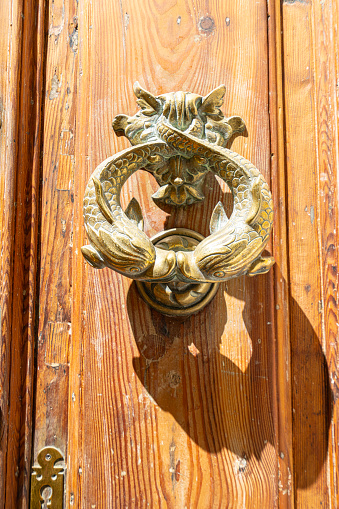 Valletta, Malta, April 03, 2024 characteristic fish-shaped handles in the doors of the buildings in the historic center of the city