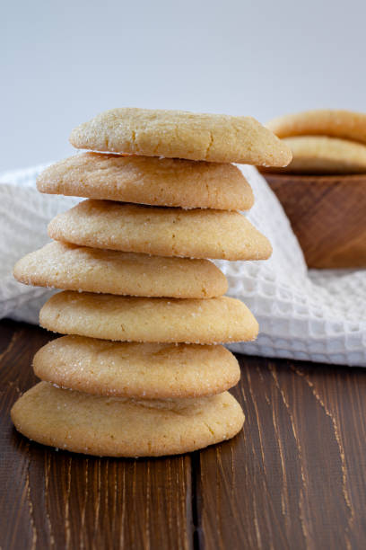 istock Delicious sugar cookies on wooden table, closeup 2149448784